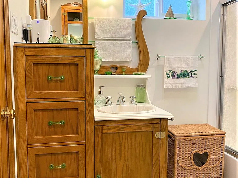 Studio Bath CORIAN Vanity doubles as a 4 drawer Dresser w/vintage green depression glass Handles, Towel Bars, & scalloped light shade