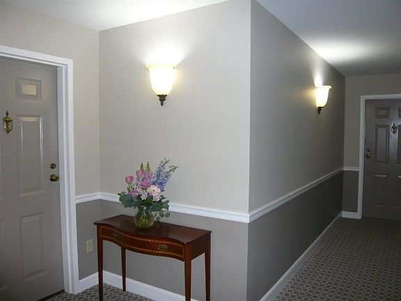 The hallways are being updated with new paint, new carpet and new lighting.
