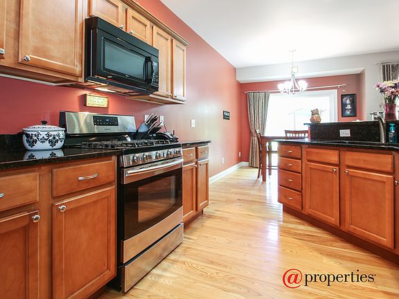 Kitchen and Dining Room with Patio Beyond