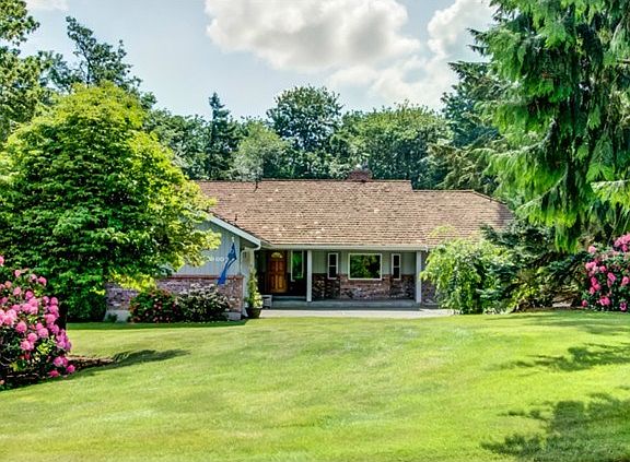 Beautifully Landscaped Home sits back from the Street!