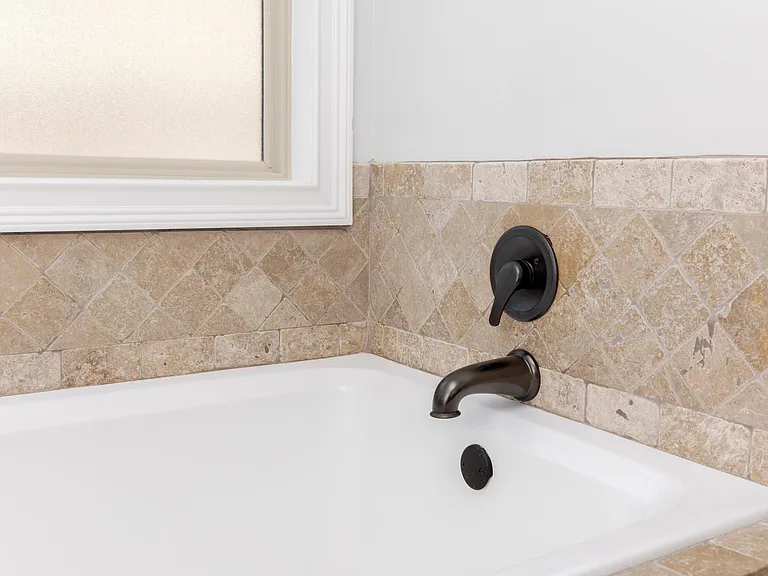 Master Bathroom w/walk in shower and tub.