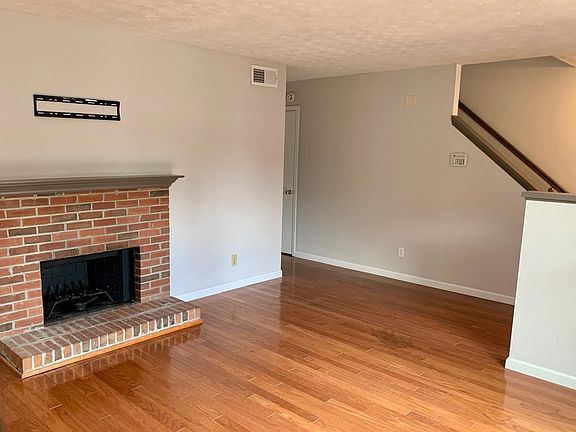 Living Room with wood burning fireplace.