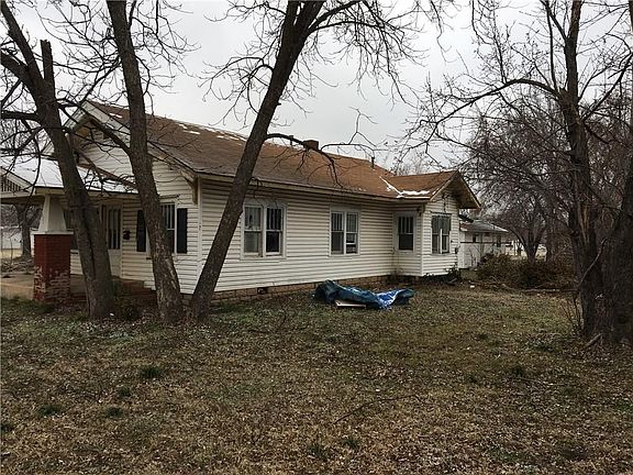 Sice of two bedroom, one bath house (201 E Highland).