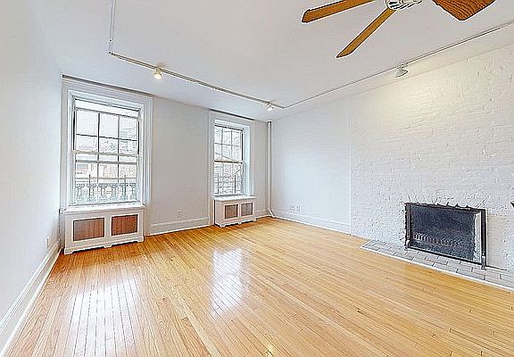 3rd image of 129 E 10th St APT 6