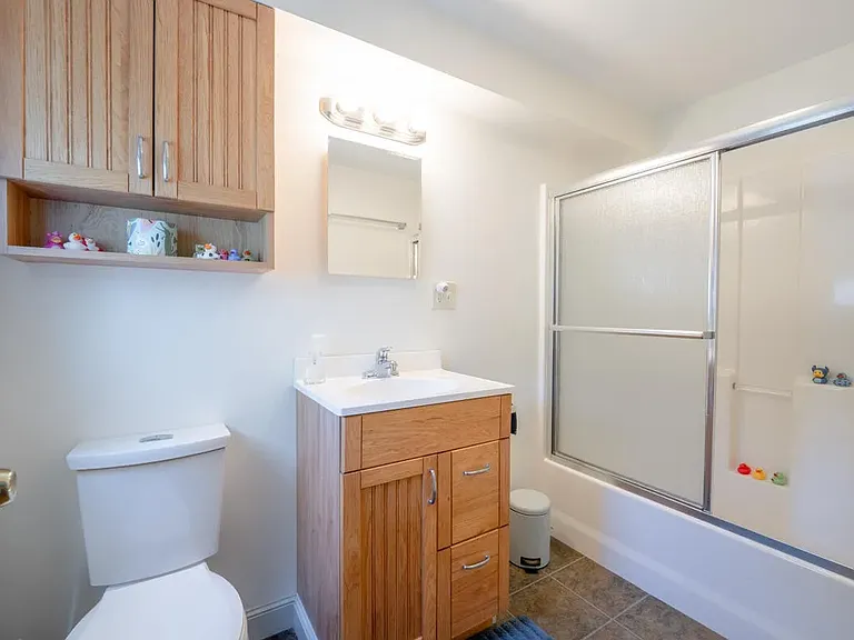 secondary bathroom across from secondary bedroom