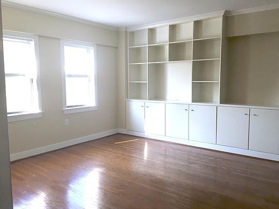 Living room with custom built-in cabinets