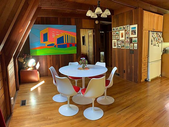 Dining room, with view of door to TV room/bedroom.