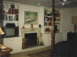 View of Upstairs Master Bedroom facing Wood Burning Fireplace