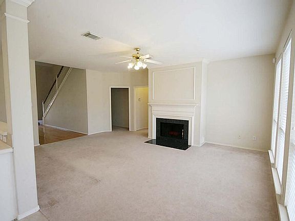  FAMILY ROOM - open to the kitchen and breakfast room, it also has a wall of windows with a view to the back yard.