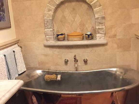 Copper tub French tile floor