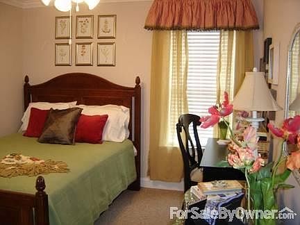 Spacious 2-Car Garage
						:
						Plenty of storage space as well as access to the attic space.