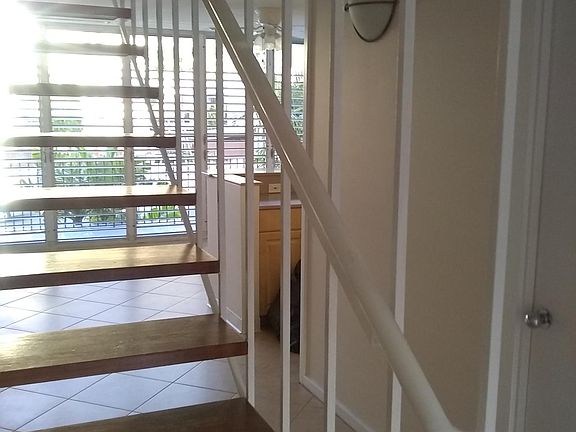 View towards kitchen and beyond from stairs
