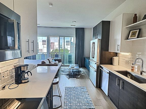 5th image of 2550 Lawrence St APT 305