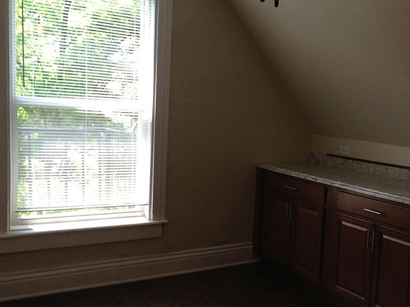 Large window in kitchen and space for table and chairs