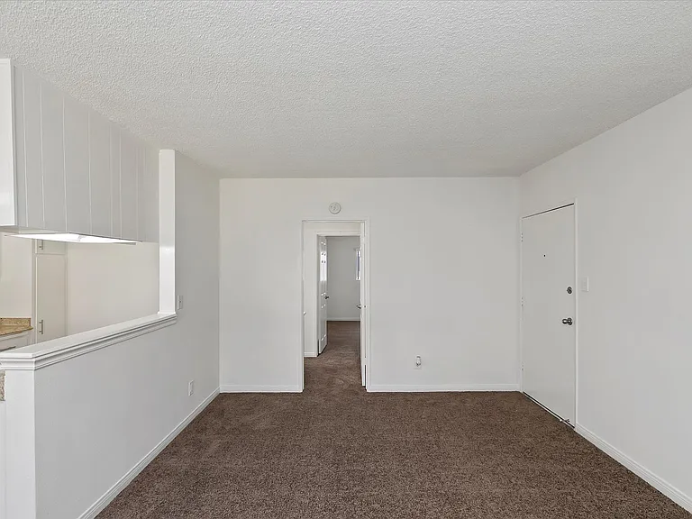 Living room and hallway to bedrooms for upstairs apartment