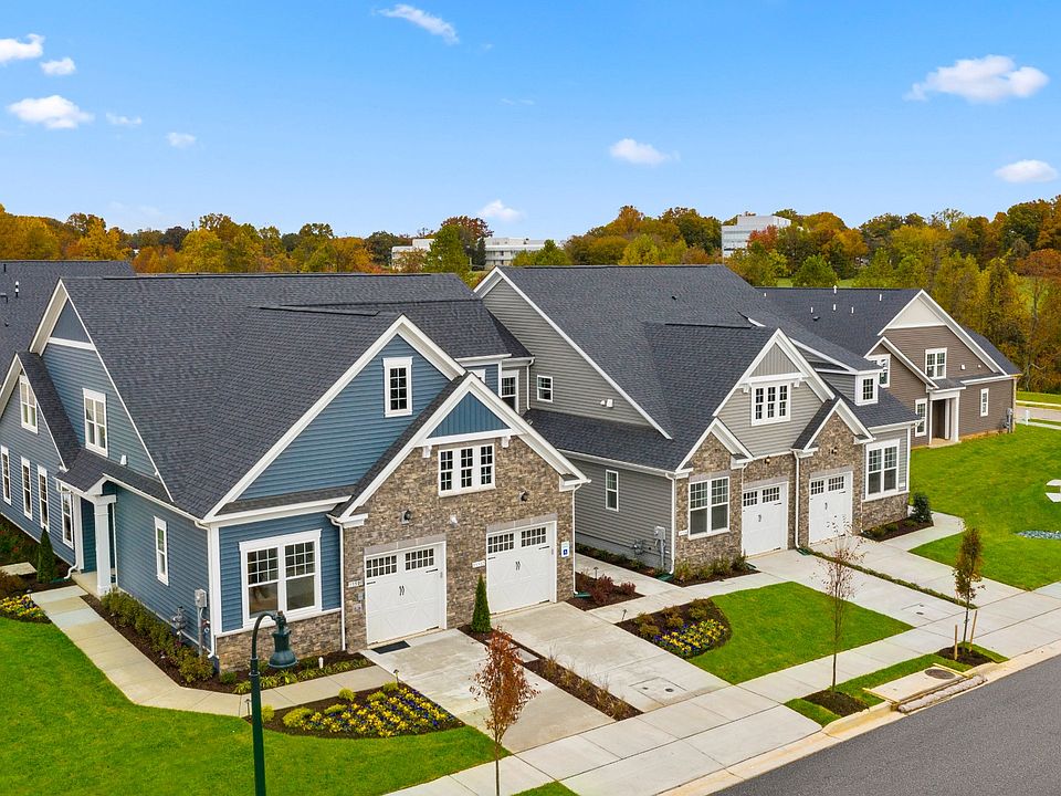 Exterior view of the Appalachian, a low-maintenance two-story villa with a main level owner s suite