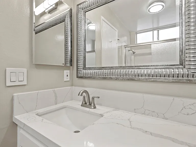 Bathroom with Sink and Mirror
