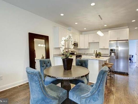 Dining area and kitchen. Stainless steel appliances have been upgraded since photo was takeb
