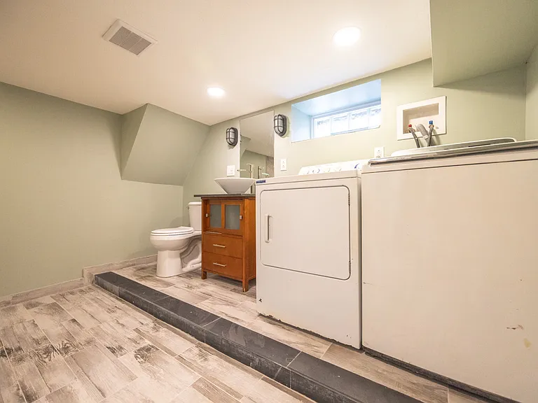 Full Bathroom, Washer and Dryer in Basement