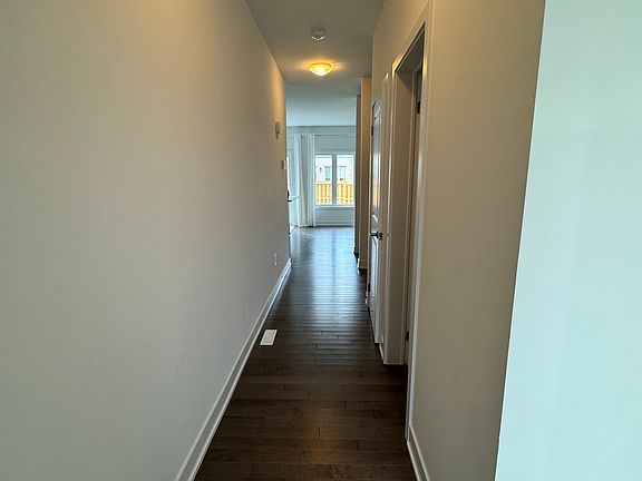 Hallway to living room and kitchen