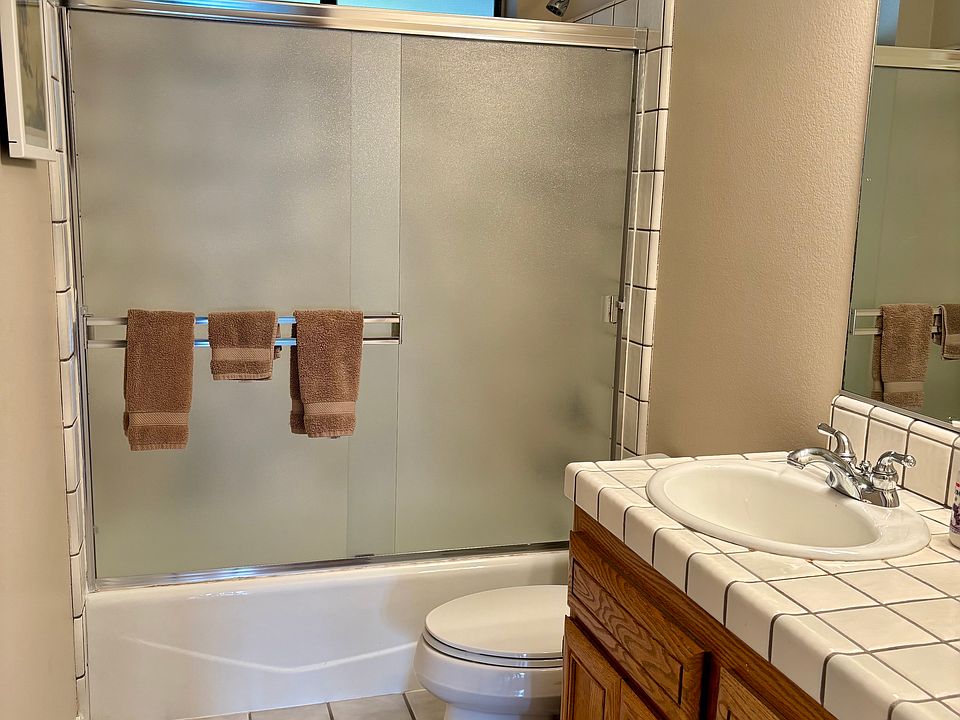 Bathroom with shower and bathtub