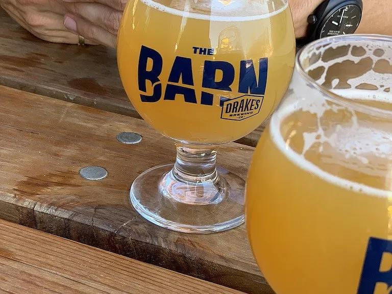 Best beer + snacks on the riverfront at Drake's