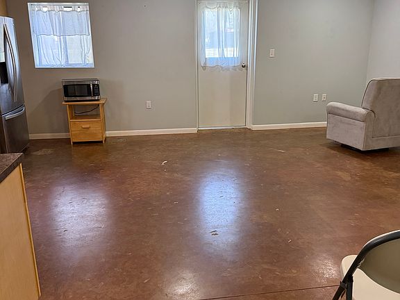 Living Area from hallway that leads to other rooms. Furniture not included.
