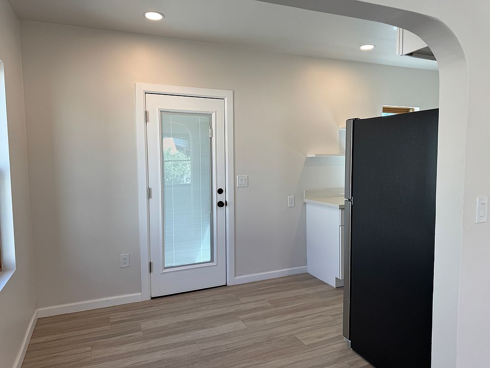 Dining Area with door to the rear covered porch and yard area