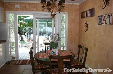 Kitchen Breakfast Nook
						:
						Enjoy reading the paper looking over the pool lania or your private deck!