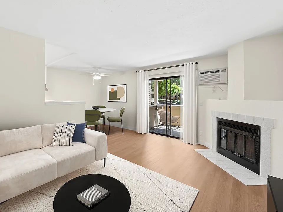 Renovated Package I living and dining area with hard surface flooring
