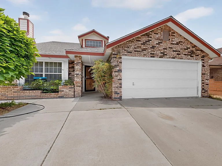 7817 Sunrose Dr NW — Photo 1