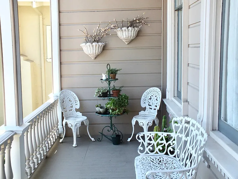 Front porch...a quiet place to sit. Liberty Street has very little traffic...more walkers than cars!