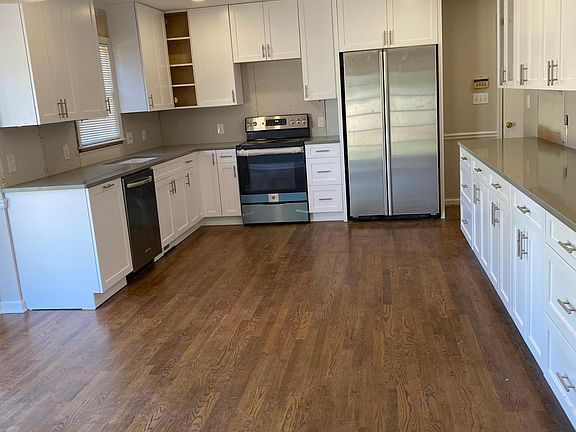 Brand new cabinets/counter/stove in kitchen