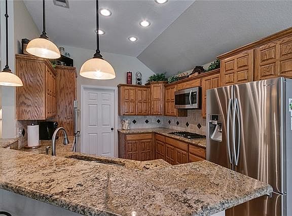 4th image of 6113 Roaring Springs Dr