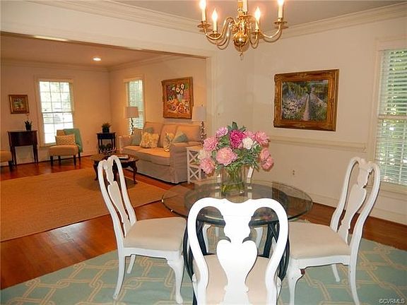 Formal Dining Room opens to Living Room.