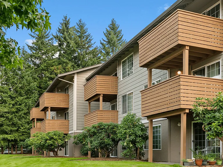 Private balconies with scenic views and lush landscaping.