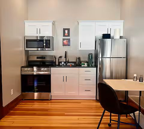 Brand new appliances, utilitarian kitchen