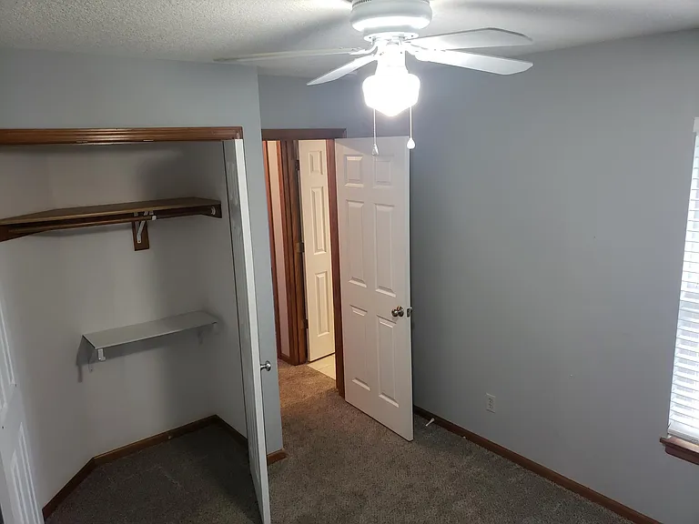 2nd floor bedroom #1, view of closet, looking out to hallway & 2nd floor bathroom