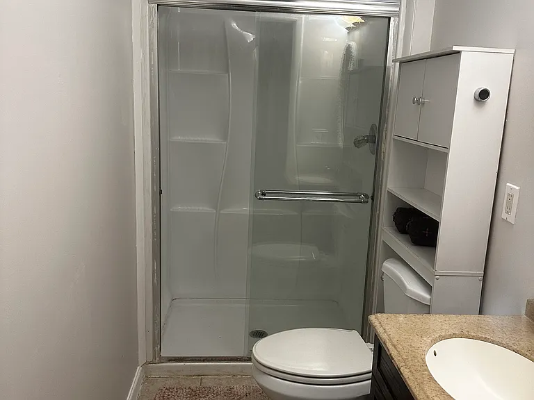 top flr back bedroom attached bathroom