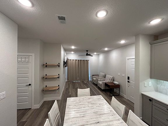 Kitchen looking over dining area and living room