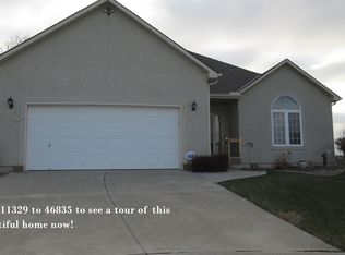 302 Alexander Creek Ct, Raymore, MO 64083