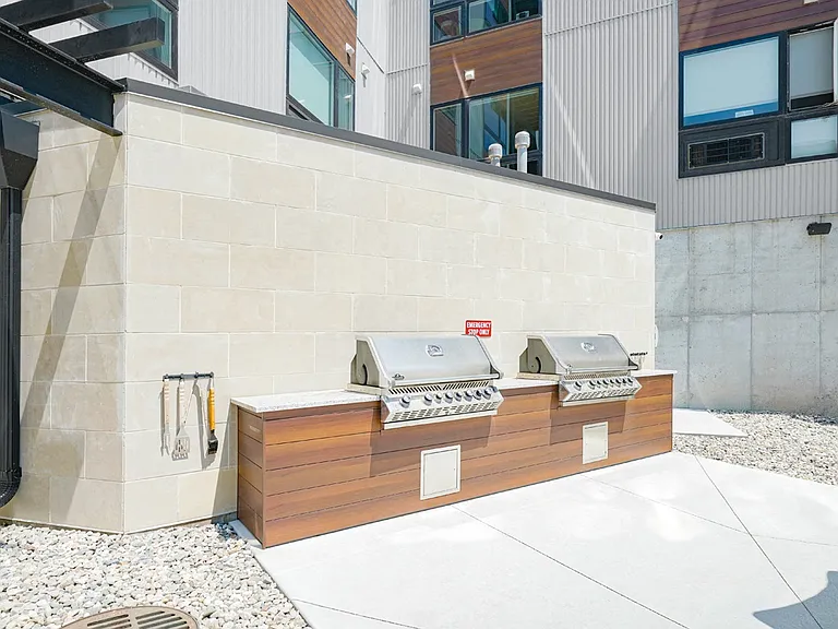 Fire up the grill and enjoy outdoor cooking at our modern barbecue station.