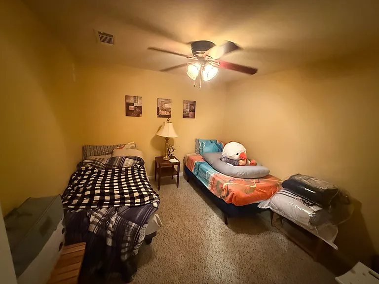 Guest den area, space in basement for if you want to bring temporary guests over. Will need to be in agreement w/ everyone for use!