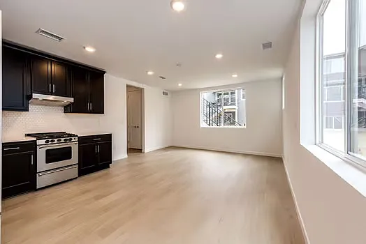Additional Suits on the 1st floor with kitchen, Laundry, bathroom and living area.