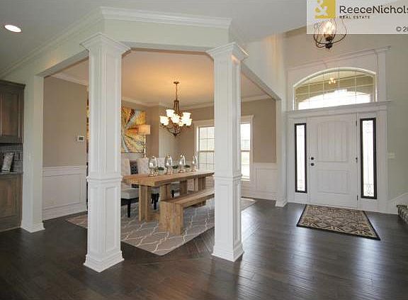 Formal Dining Room w/ wood flooring.