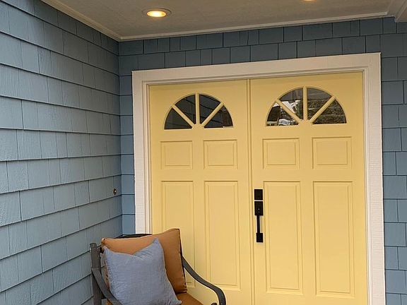 Protected double door entrance patio area