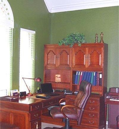 To the left of the Foyer, french doors lead into the Office / Study area.
