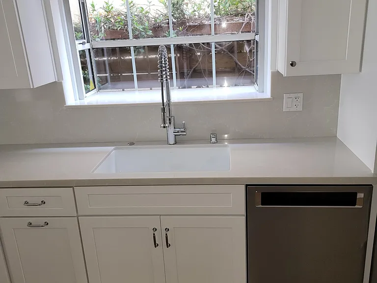 New Graff sink and Kitchen Aid dishwasher.