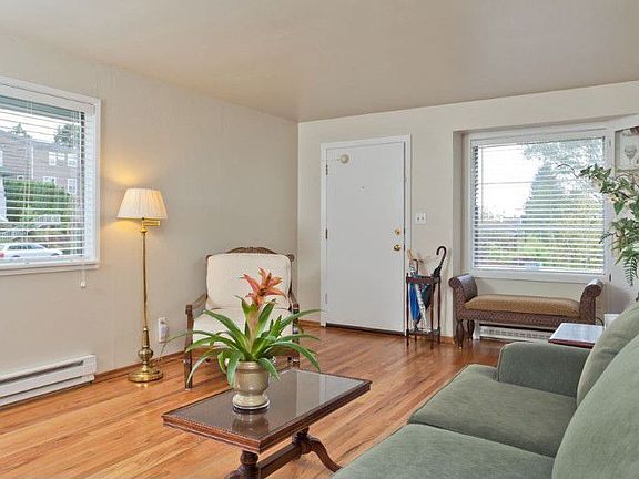 Amazing yard and lot! This view shows the full extent of the Upper and Lower yards. Across Glenridge Way SW is the additional part of the property, the grassy area of approx. 50' x 20'.