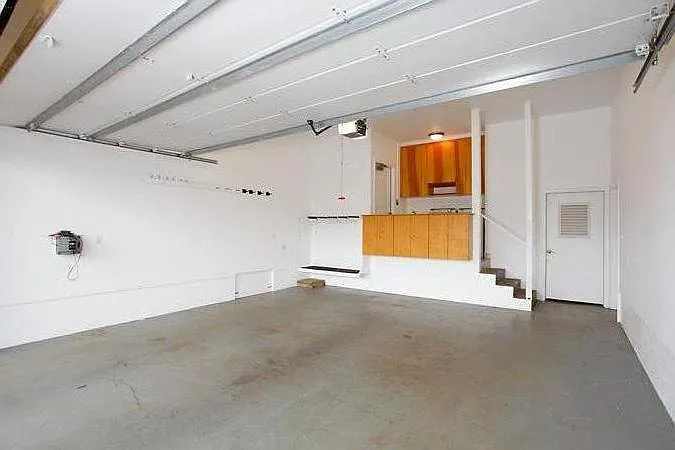 Main 2 car garage with shared laundry area.